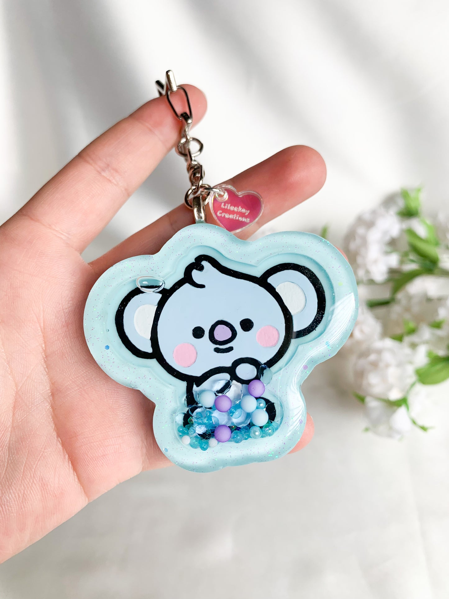 BT Sitting Baby Shaker Keychains
